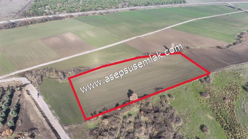 10.657 m2 Çiftlik Bağ-Bahçe Kadastro Yola Cepheli Bayramiç'te