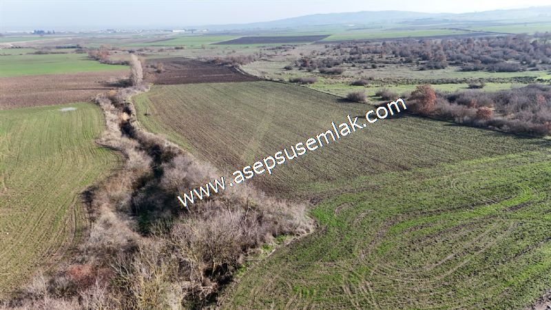 10.657 m2 Çiftlik Bağ-Bahçe Kadastro Yola Cepheli Bayramiç'te