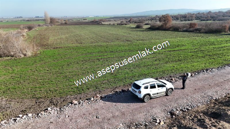 10.657 m2 Çiftlik Bağ-Bahçe Kadastro Yola Cepheli Bayramiç'te